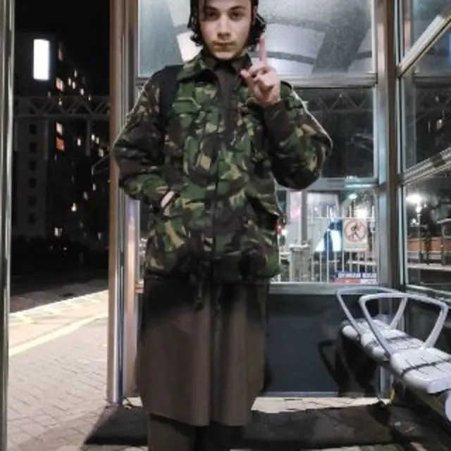 A selfie taken by King on a train station platform