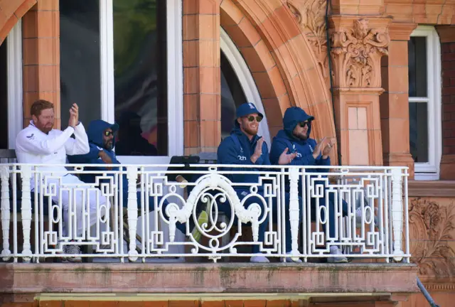 England head coach Brendon McCullum (right) and Ben Stokes watch the action from a balcony during day two of the first LV= Insurance Test match at Lord's