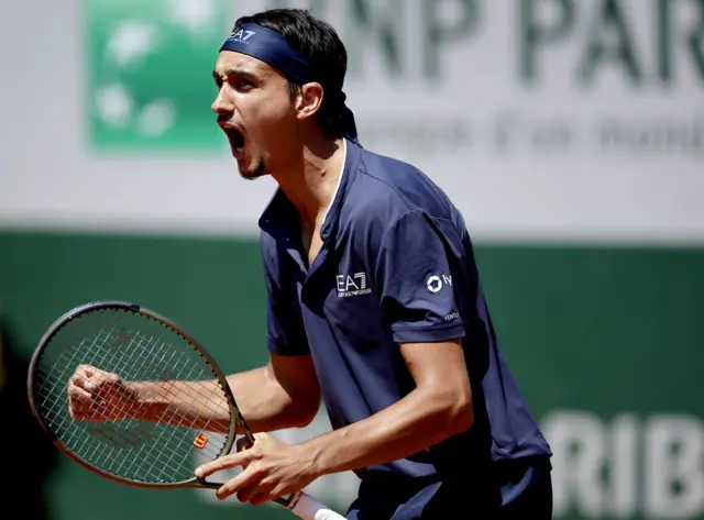 Lorenzo Sonego celebrates