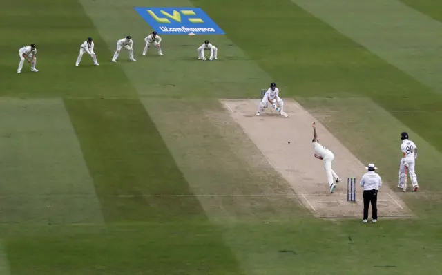 Joe Root prepares to reverse ramp Pat Cummins first ball of the day