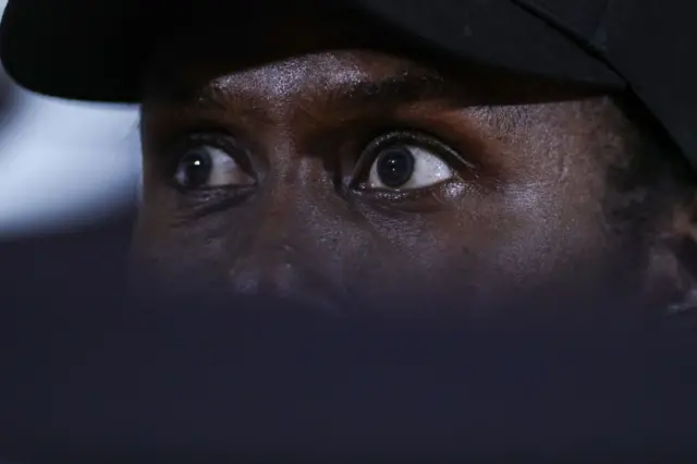 Aliou Cissé's eyes seen close up.