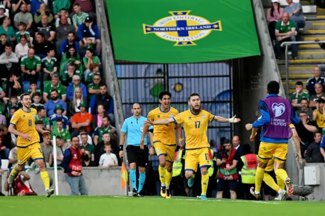 Abat Aymbetov of Kazakhstan celebrates scoring against Northern Ireland