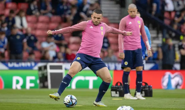 John McGinn warming up at Hampden