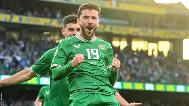 Mikey Johnston celebrates breaking the deadlock for Republic of Ireland