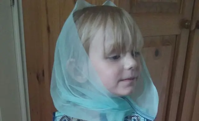 Nadia in a headscarf