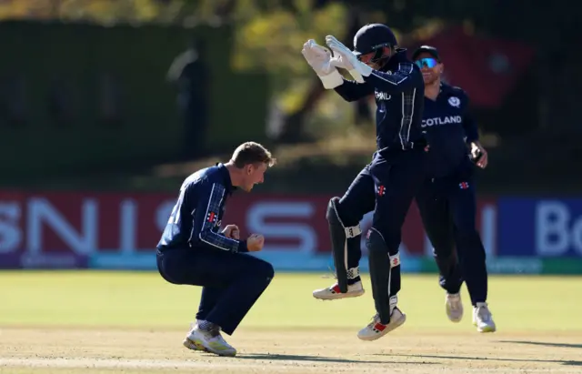 Brandon McMullen celebrates with Tomas Mackintosh