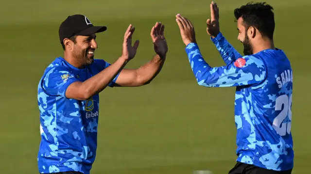 Ravi Bopara (L) and Shadab Khan