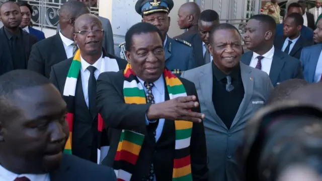 Zimbabwean President Emmerson Mnangagwa (C) arrives at the High Court in Harare, Zimbabwe - 21 June 2023