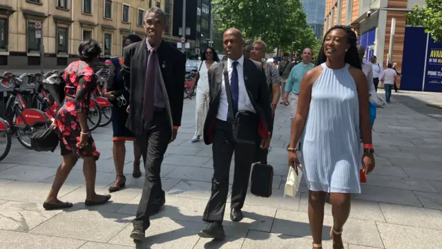 Colin, Gordon and Jacky make their way through the streets of London