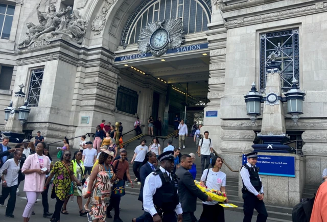 Procession leaves Waterloo station