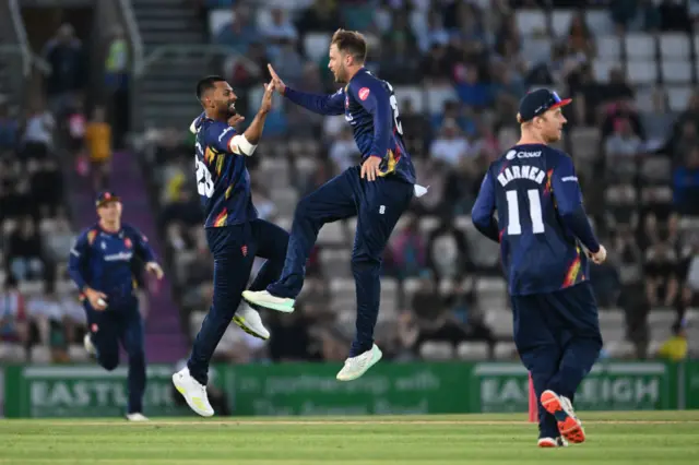 Matt Critchley celebrates the wicket of James Vince