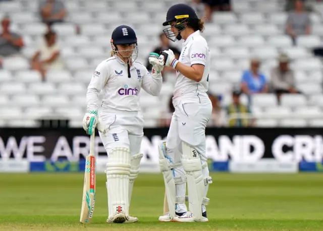 England’s Nat Sciver-Brunt (right) and Tammy Beaumont during day two of the first Women's Ashes test match at Trent Bridge, Nottingham