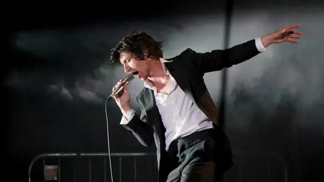 Arctic Monkeys performing at the Glastonbury Festival