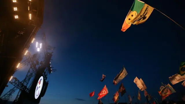 Flags fly at the Pyramid Stage