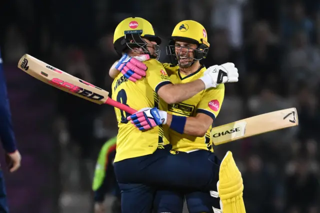 Liam Dawson and Benny Howell of Hampshire celebrate victory