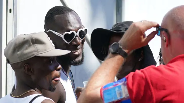 Stormzy smiling in a crowd