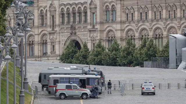 Police guard an entrance to Red Square in Moscow