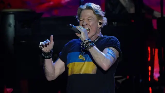 Guns N' Roses performing on the Pyramid Stage at the Glastonbury Festival at Worthy Farm