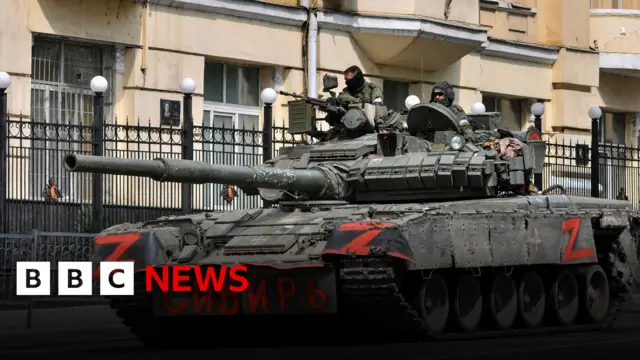 Wagner Group ride a tank in downtown Rostov-on-Don