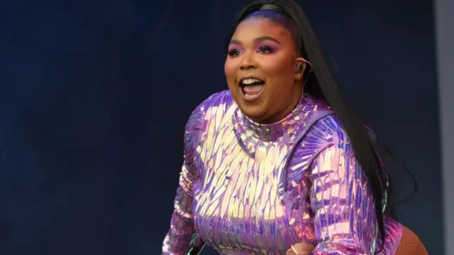 Lizzo in a sparkly outfit