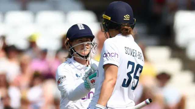 Tammy Beaumont and Nat Sciver-Brunt punch gloves