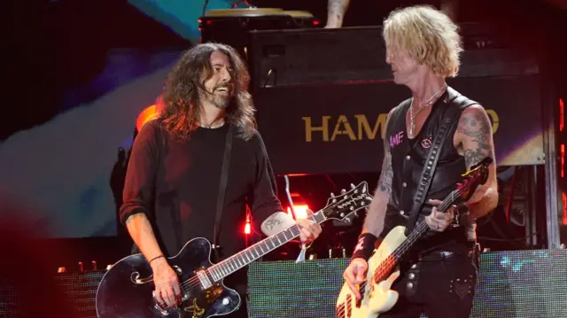 Dave Grohl joins Guns N' Roses on stage performing on the Pyramid Stage