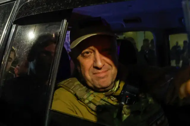 Yevgeny Prigozhin is seen leaving the military headquarter in Rostov-on-Don