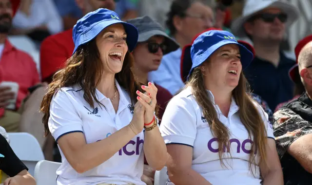 England fans celebrate a boundary