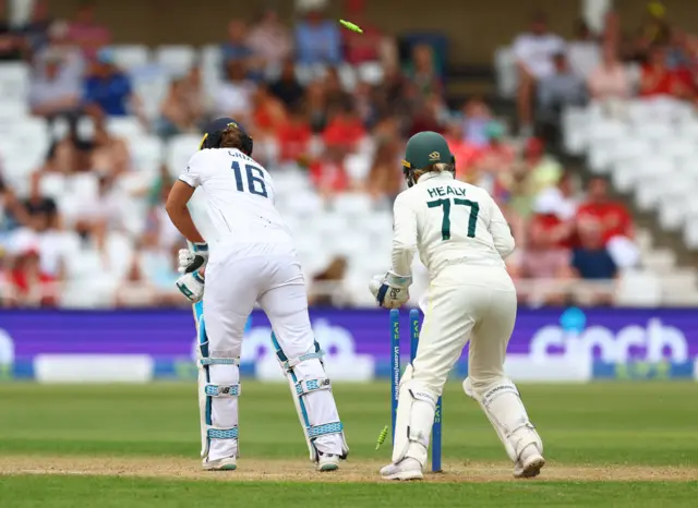 Kate Cross is bowled by Tahlia McGrath