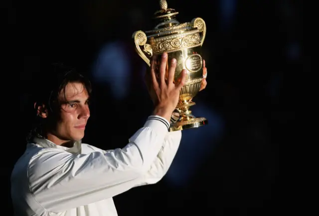 Rafael Nadal with Wimbledon trophy