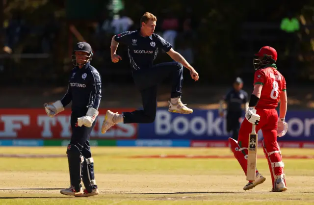 Brandon McMullen celebrates his wicket