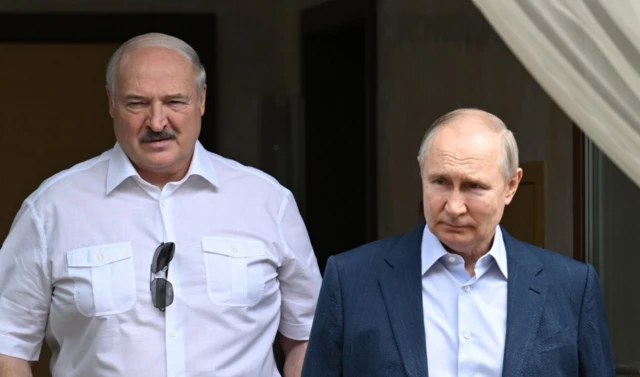 Belarus' Lukashenko (left) with Russian leader Putin two weeks ago in Sochi, Russia