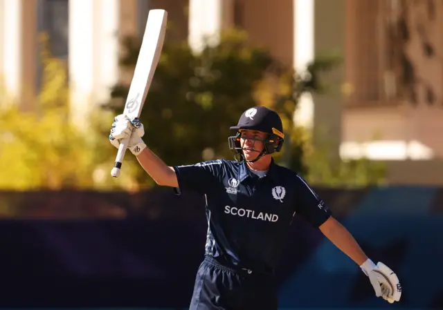 Brandon McMullen celebrates his maiden hundred for Scotland