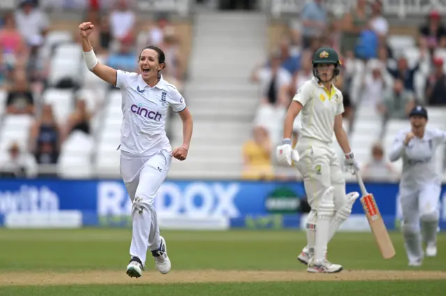 Kate Cross celebrates the wicket of Ash Gardner