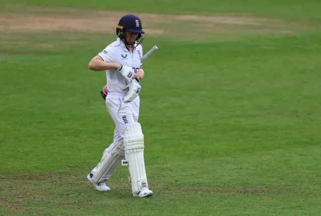 Heather Knight walks off after being dismissed