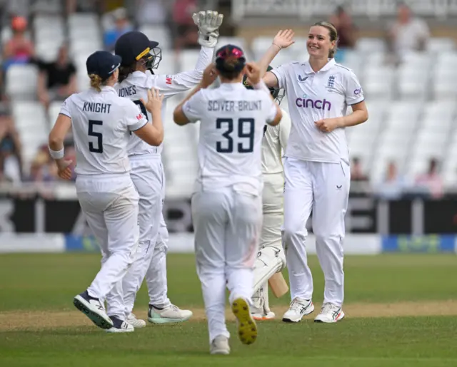 Lauren Bell celebrates the wicket of Alana King