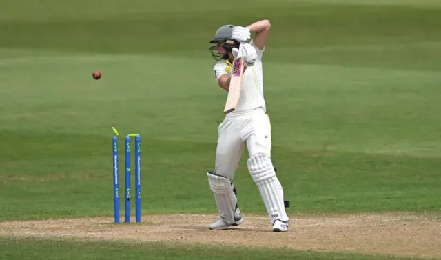 Ellyse Perry is bowled by Lauren Filer