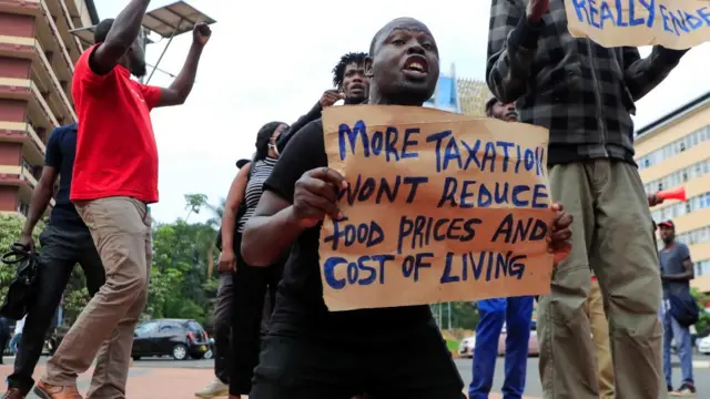 A Kenyan social-political activist chants slogans during a protest to call on lawmakers to reject the finance bill proposed by the government that would raise various taxes, outside the Parliament buildings in Nairobi, Kenya June 13, 2023