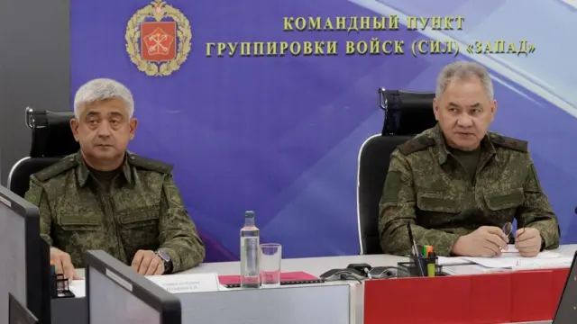 Russian Defence Minister Sergei Shoigu and Colonel General Yevgeny Nikiforov, commander of troops of the Western Military District, visit the advanced control post of Russian troops