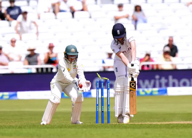 Lauren Filer is bowled by Ash Gardner