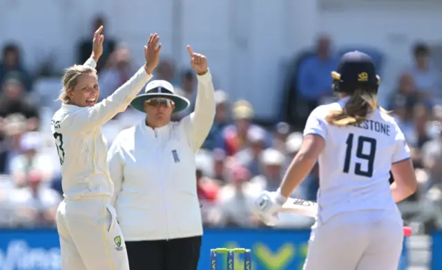 Ash Gardner celebrates the wicket of Sophie Ecclestone