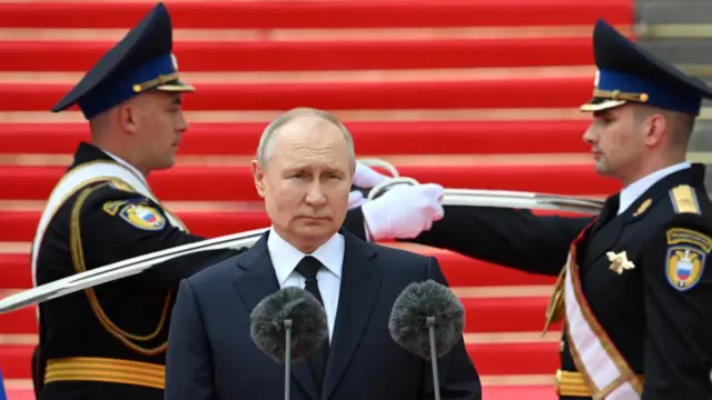 Russian President Putin addresses service members in Moscow