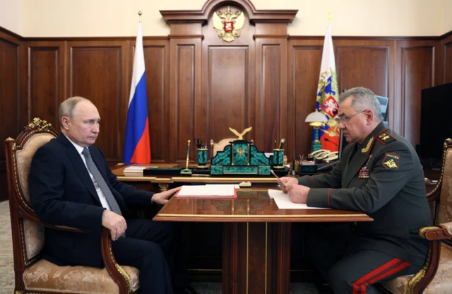 Putin is in a meeting with Defence Minister Sergei Shoigu in Moscow in April, 2023