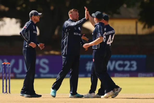 Scotland celebrate the wicket of Kasun Rajitha