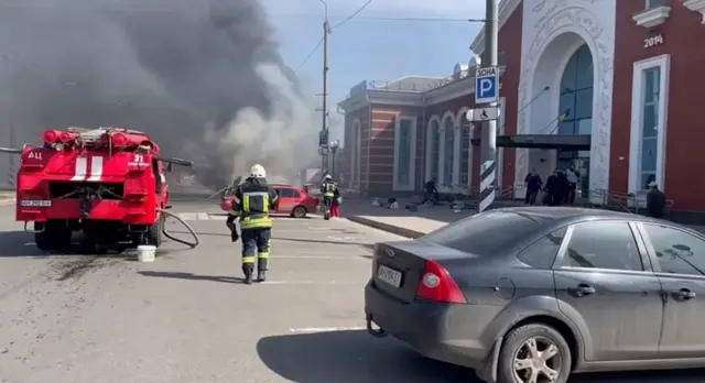 Firefighters respond to the station attack