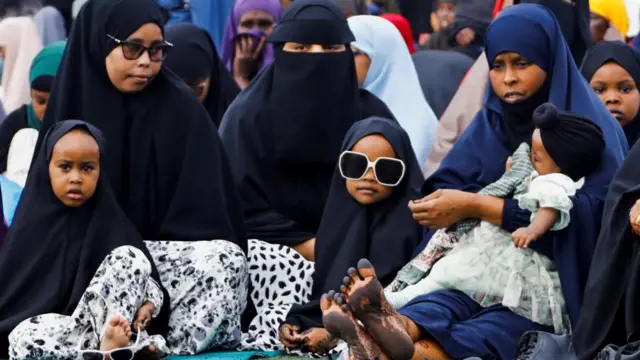 People attend prayers on the first day of Muslim holiday of Eid al-Adha, at the Mogadishu Stadium in Mogadishu, Somalia - 28 June 2023