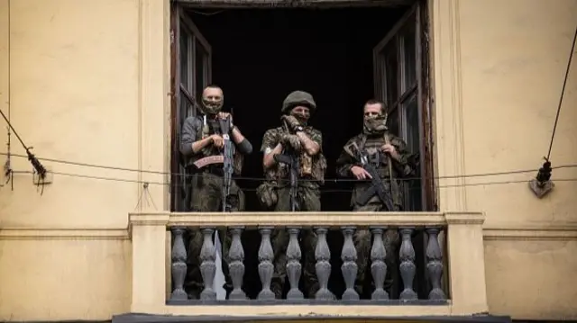 Wagner mercenaries are seen in the city of Rostov-on-Don, on June 24