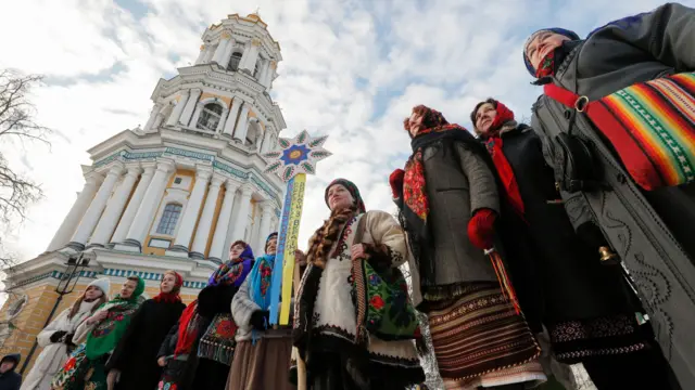 People sing Christmas carols in Kyiv