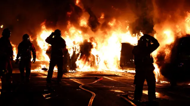 Firefighters tackling a blaze