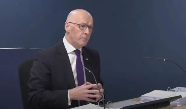 John Swinney giving evidence at the inquiry